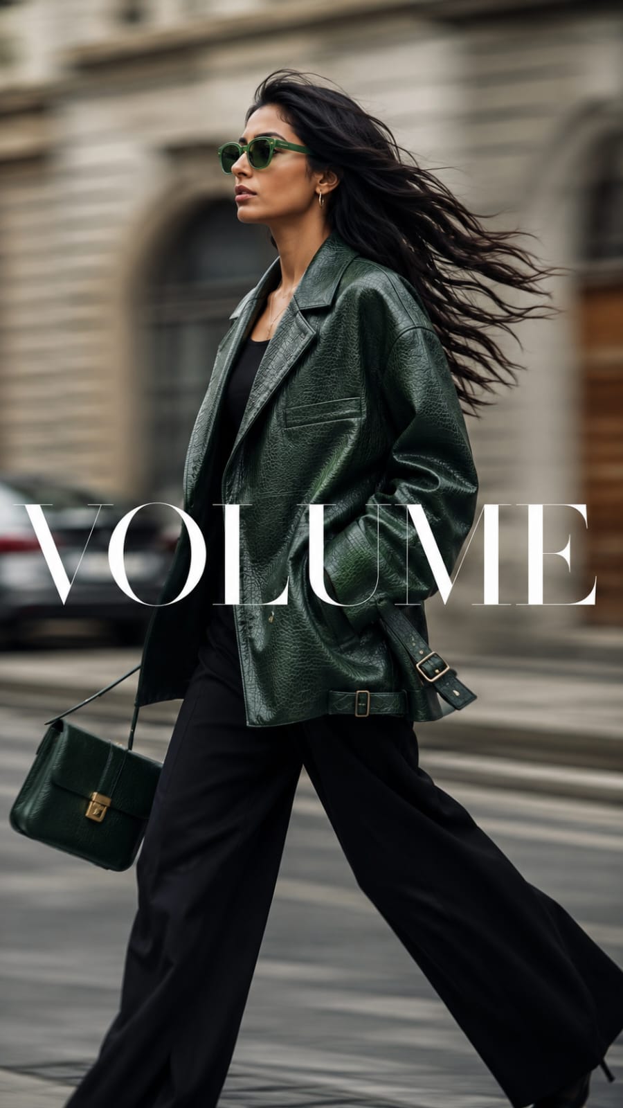 Ultra realistic luxury street style fashion editorial featuring a woman in an emerald green leather jacket walking through a European city